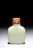 A WHITE JADE CARVED SNUFF BOTTLE