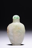 A JADEITE CARVED SNUFF BOTTLE