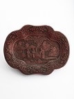 A CINNABAR LACQUER 'FIGURES' DISH