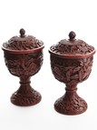 A PAIR OF CINNABAR LACQUER VASES AND COVER