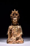 A GILT BRONZE FIGURE OF GUANYIN AVALOKITESVARA