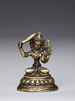 A SMALL BRONZE FIGURE OF MANJUSRI