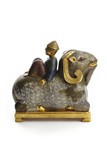 A GILT-BRONZE AND CLOISONNE ENAMEL RAM AND BOY