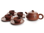 XU XUEJUAN: A SET OF YIXING ZISHA TEAPOT AND CUPS