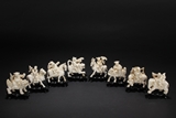 A SET OF 'EIGHT IMMORTALS' IVORY CARVINGS