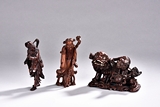 A SET OF THREE HARDWOORD BAMBOO CARVINGS