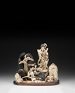 A JAPANESE CARVED IVORY FIGURAL GROUP