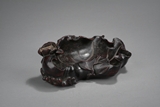 A CARVED ZITAN 'LOTUS AND CRAB' WASHER