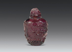 A PURPLE COLOR CARVED GLASS SNUFF BOTTLE