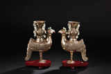 A PAIR OF SILVER PHOENIX ZUN VASES INSET WITH GEMS