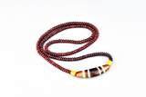A TRI-COLOR CHUNG DZI BEAD NECKLACE