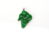 A 'DOVE' JADEITE 14K WHITE GOLD & DIAMOND PENDANT
