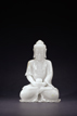 A WHITE JADE CARVED FIGURE OF BUDDHA