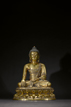 A GILT-BRONZE FIGURE OF SHAKYAMUNI