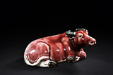 A RED-GLAZE BUFFALO