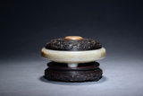 A WHITE JADE CIRCULAR INKSTONE WITH ZITAN COVER