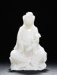 A WHITE JADE CARVED FIGURE OF GUANYIN