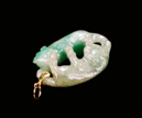 A JADEITE 'BUDDHIST LIONS' PENDANT