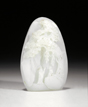 A WHITE JADE CARVED BOULDER