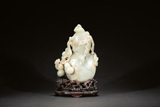 A WHITE JADE DOUBLE GOURD VASE