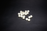 A GROUP OF WHITE JADE BEADS