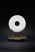 A WHITE JADE 'TAOTIE' DISC TABLE SCREEN
