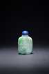 A JADEITE CARVED 'CARPS' SNUFF BOTTLE