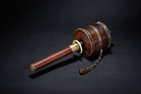 A BRONZE TIBETAN PRAYER'S WHEEL