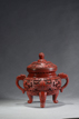 A CINNABAR LACQUER ARCHAISTIC TRIPOD VESSEL
