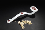 A RED OVERLAY WHITE GLASS RUYI SCEPTER