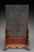 A CARVED HARDWOOD TABLE SCREEN INSET WITH DUAN STONE