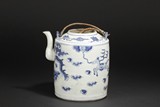 A BLUE AND WHITE TEAPOT