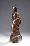 A BRONZE FIGURE OF HUA TUO