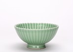 A CELADON GLAZED 'CHRYSANTHEMUM' BOWL