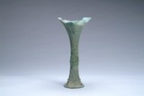 A CHINESE BRONZE 'GU' DRINKING VESSEL