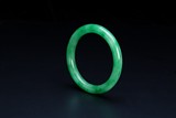 A CHINESE JADEITE BANGLE