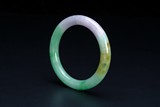 A CHINESE THREE COLORED JADEITE BANGLE