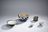 A GROUP OF FIVE CERAMIC VESSELS
