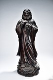 A LARGE HARDWOOD OR ZITAN FIGURE OF BODHIDHARMA