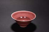 A RED GLAZED BOWL