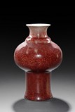 A RED GLAZED VASE