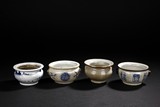 A SET OF FOUR CERAMIC CENSERS