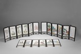 A SET OF THREE PORCELAIN TABLE SCREENS