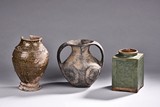A SET OF THREE POTTERY VASES