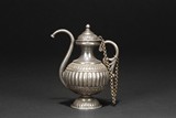 A SILVER WINE EWER