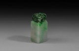 A SPINACH JADE CARVED STAMP SEAL
