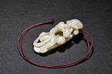 A WHITE JADE CHILONG PENDANT