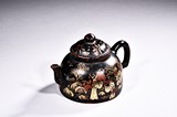 A YIXING GILTED DECORATED TEAPOT