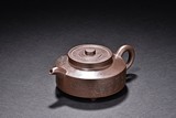 A YIXING ZISHA 'INSCRIPTION' TEAPOT