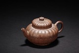 A YIXING ZISHA CHRYSANTHEMUM TEAPOT